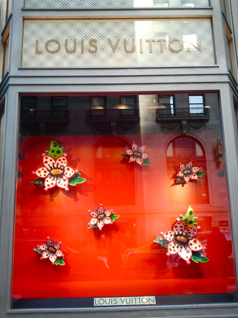 Japan. Louis Vuitton display window with chequered cloth stuffed